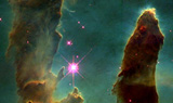 Kleines Foto zeigt Ausschnitt des Adlernebels M 16 (IC 4703)