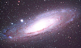 Kleines Foto zeigt die Spiralgalaxie M 31 (Großer Andromedanebel)
