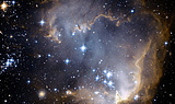 Kleines Foto zeigt den offenen Sternhaufen NGC 602 in der Kleinen Magellanschen Wolke