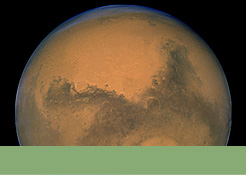 Foto mit Link zur Bildergalerie: Teilansicht des Planeten Mars